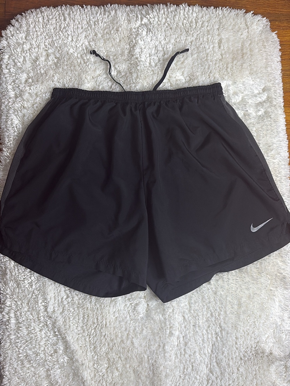 Nike Women’s Black Athletic Shorts with Gray Reflective Swoosh